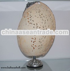 melo carving art indonesia with silver plate