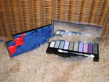 Cosmetics manufacturer in China.Face powder in mirror container to make up beauty shimming eyes
