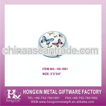 HX-1951 Round butterfly metal 4-compartment pill box