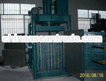 Hydraulic vertical baling machine